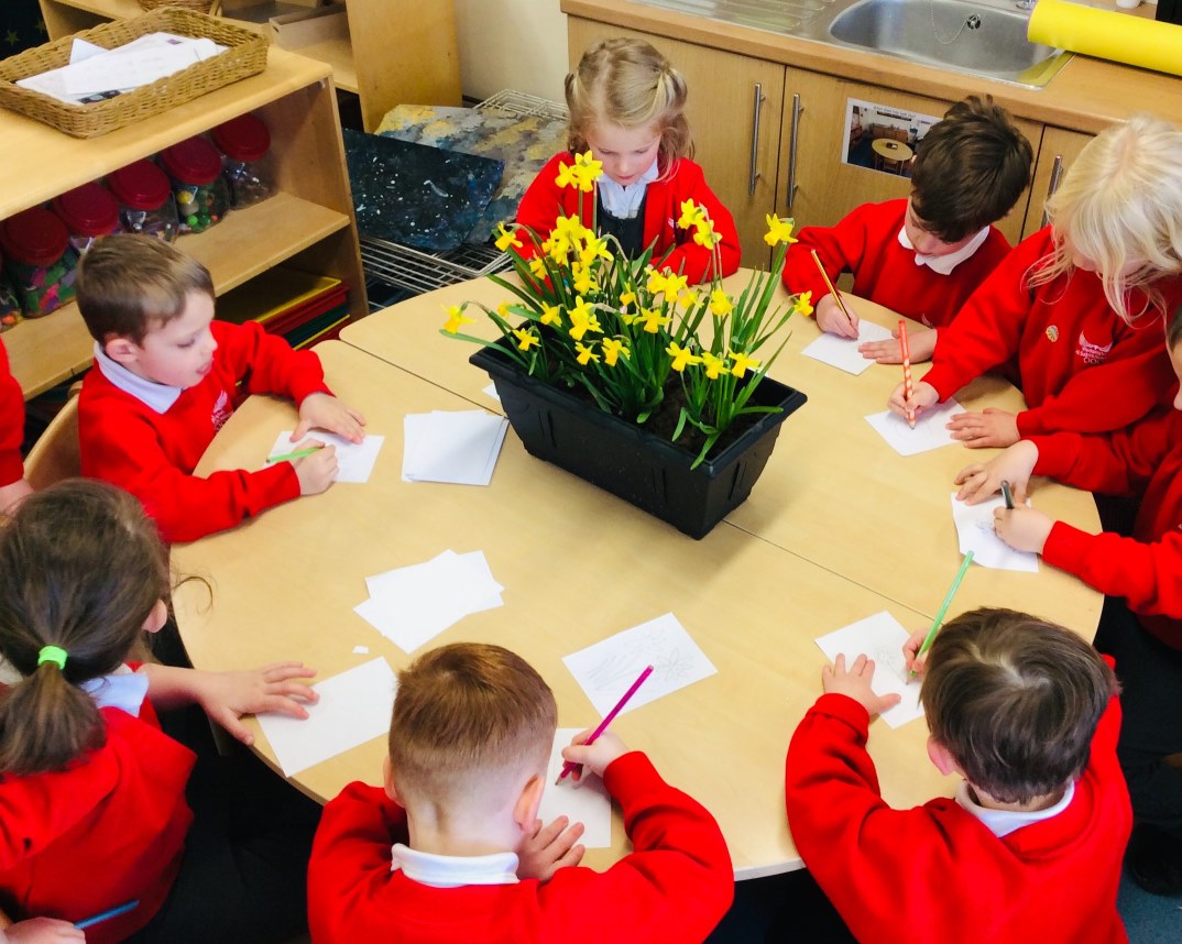 children drawing flowers
