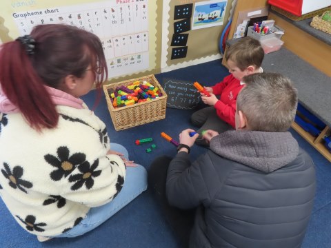 parents with child playing